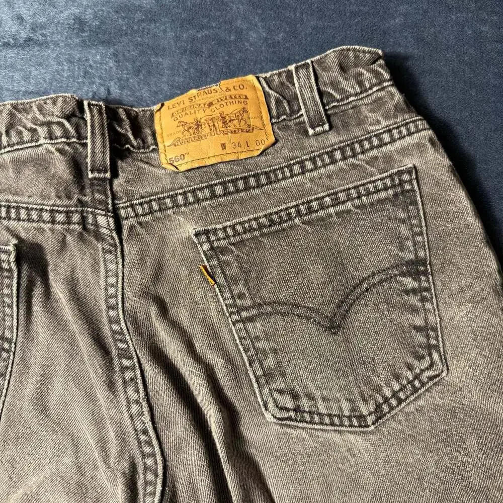 Vintage Levi's 560 Orange Tab Faded Black Denim Jean Shorts Size 34